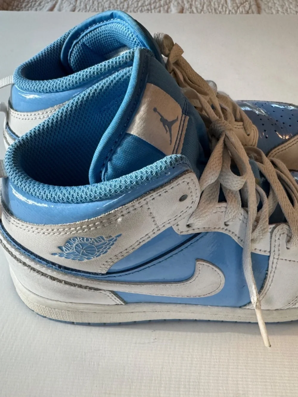 Air Jordan I Mid Youth size 3Y. Light blue and white.